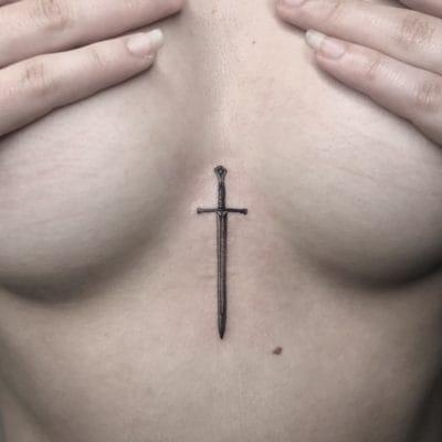 tattoo espada micro realismo