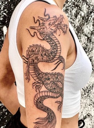 tattoo dragón fine line